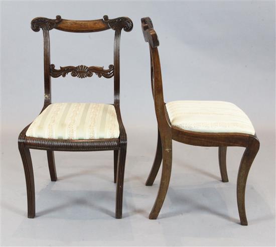 A set of ten Regency brass strung mahogany dining chairs, W.1ft 8in. H.2ft 11in.